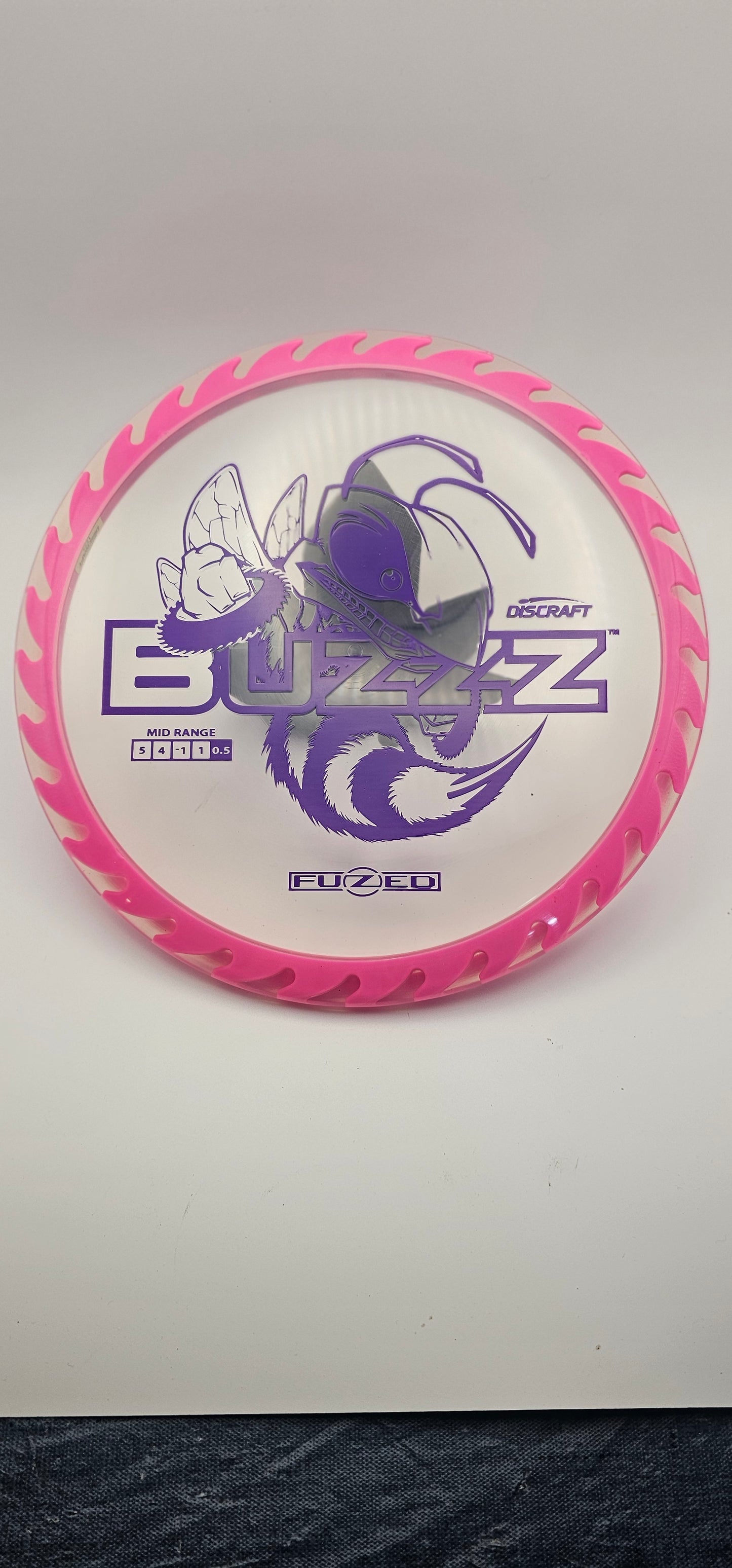 Discraft - FuZed Buzzz - Clear Plate - pink blades - Buzzzsaw - 177g+ - Purple Foil