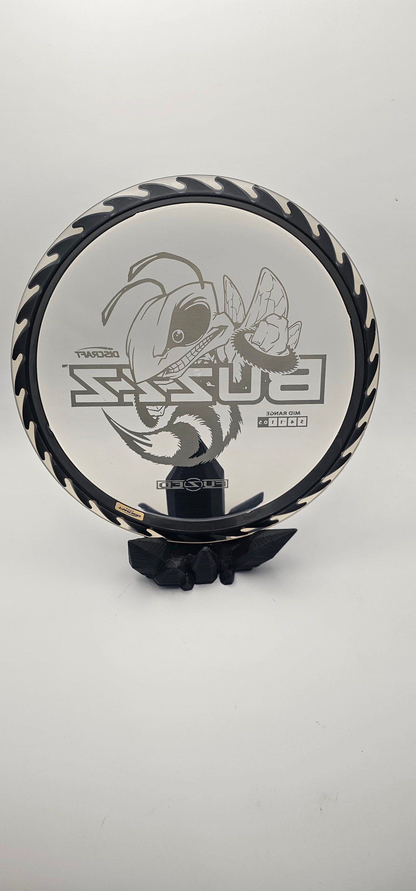 Discraft - FuZed Buzzz - Clear Plate - Black blades - Buzzzsaw - 177g+ - Purple Foil